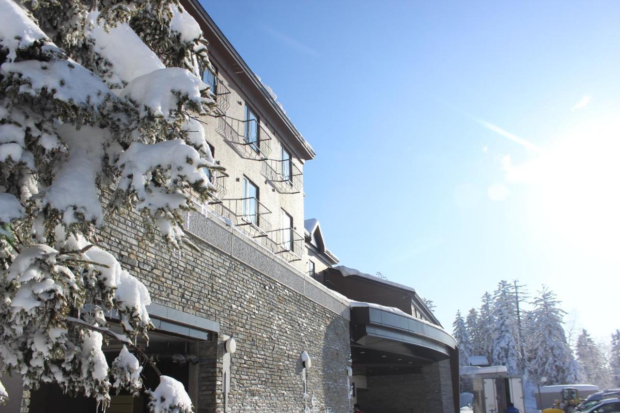 Higashikawa Asahidake Onsen Hotel Bear Monte Esterno foto