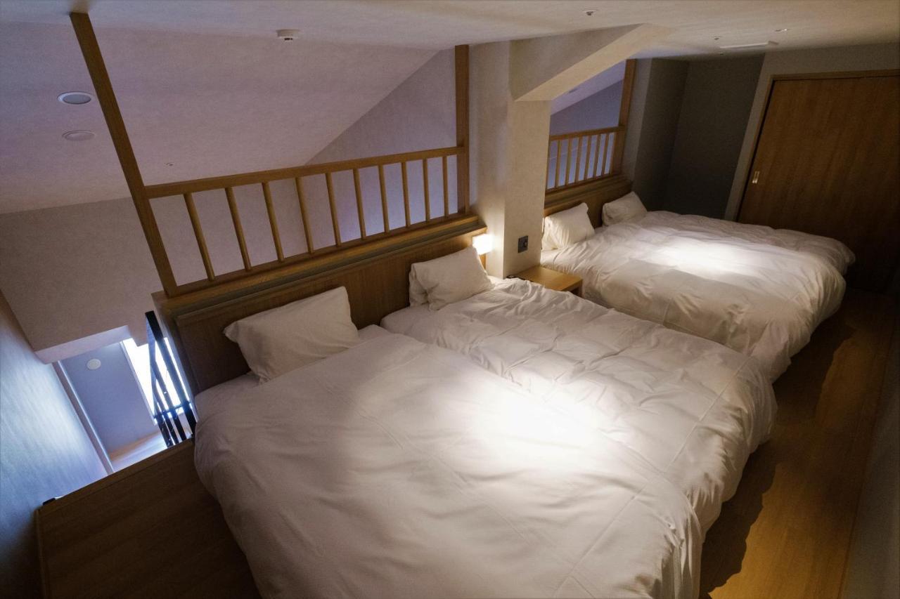 Higashikawa Asahidake Onsen Hotel Bear Monte Esterno foto