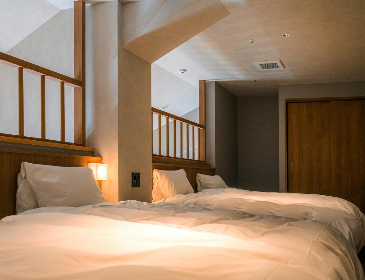 Higashikawa Asahidake Onsen Hotel Bear Monte Esterno foto