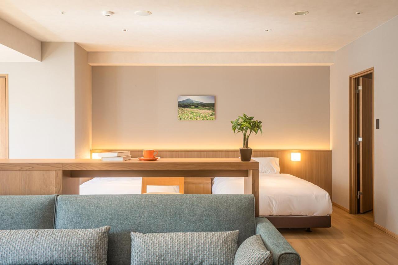 Higashikawa Asahidake Onsen Hotel Bear Monte Esterno foto