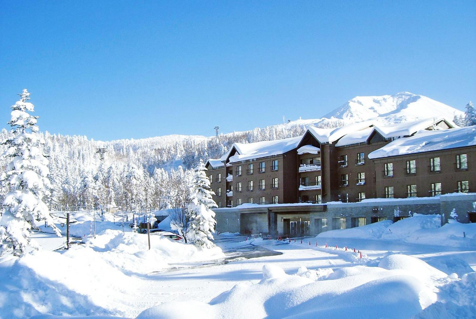 Higashikawa Asahidake Onsen Hotel Bear Monte Esterno foto