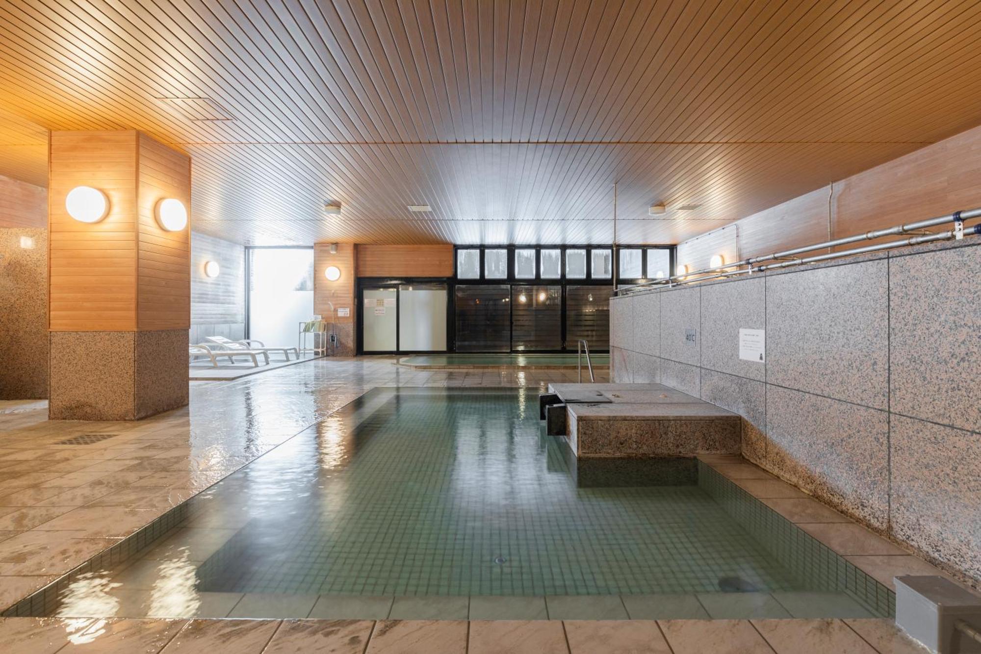 Higashikawa Asahidake Onsen Hotel Bear Monte Esterno foto