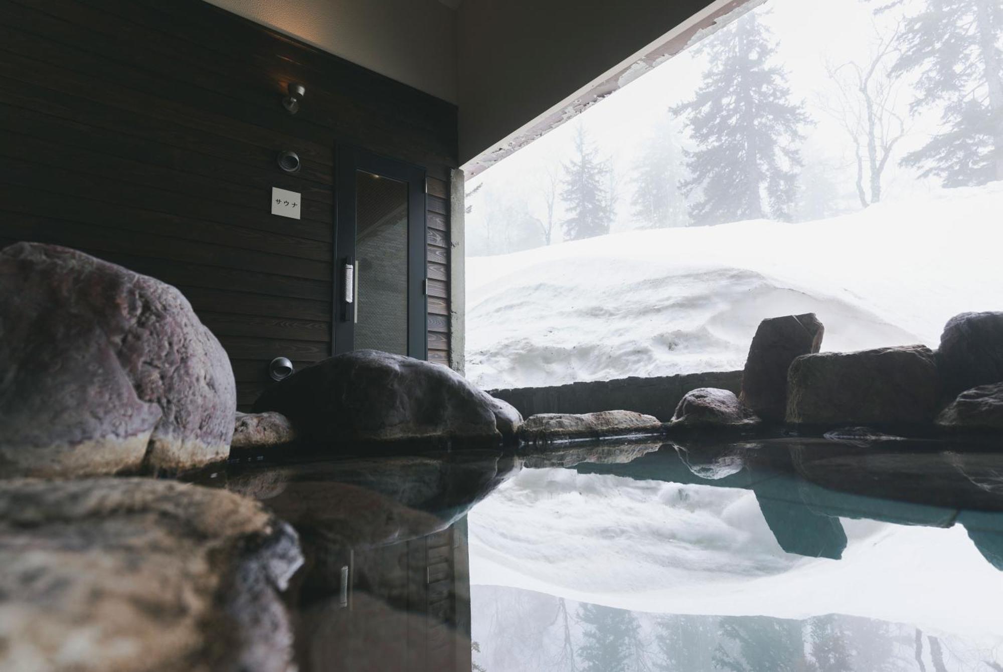 Higashikawa Asahidake Onsen Hotel Bear Monte Esterno foto