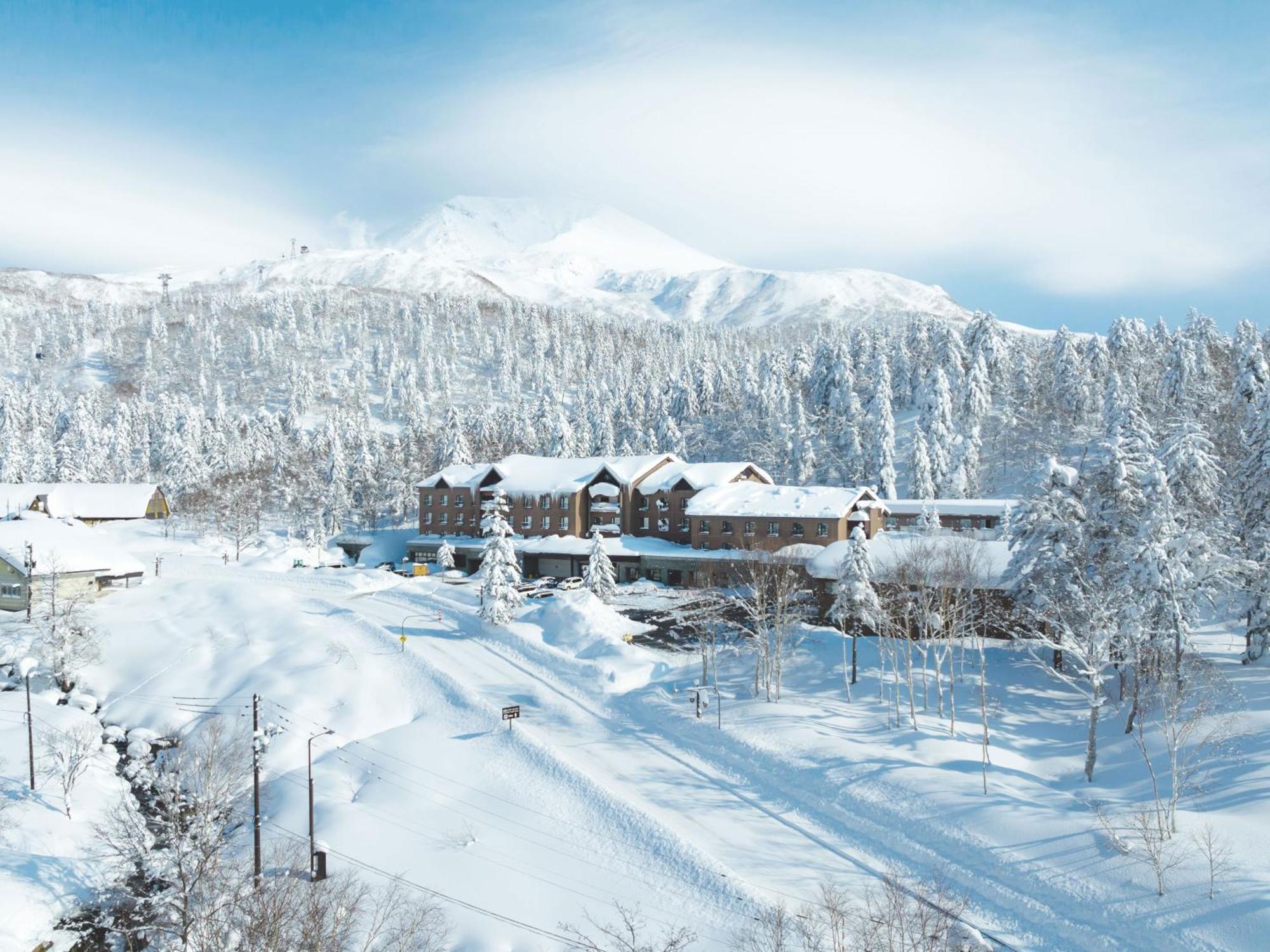 Higashikawa Asahidake Onsen Hotel Bear Monte Esterno foto
