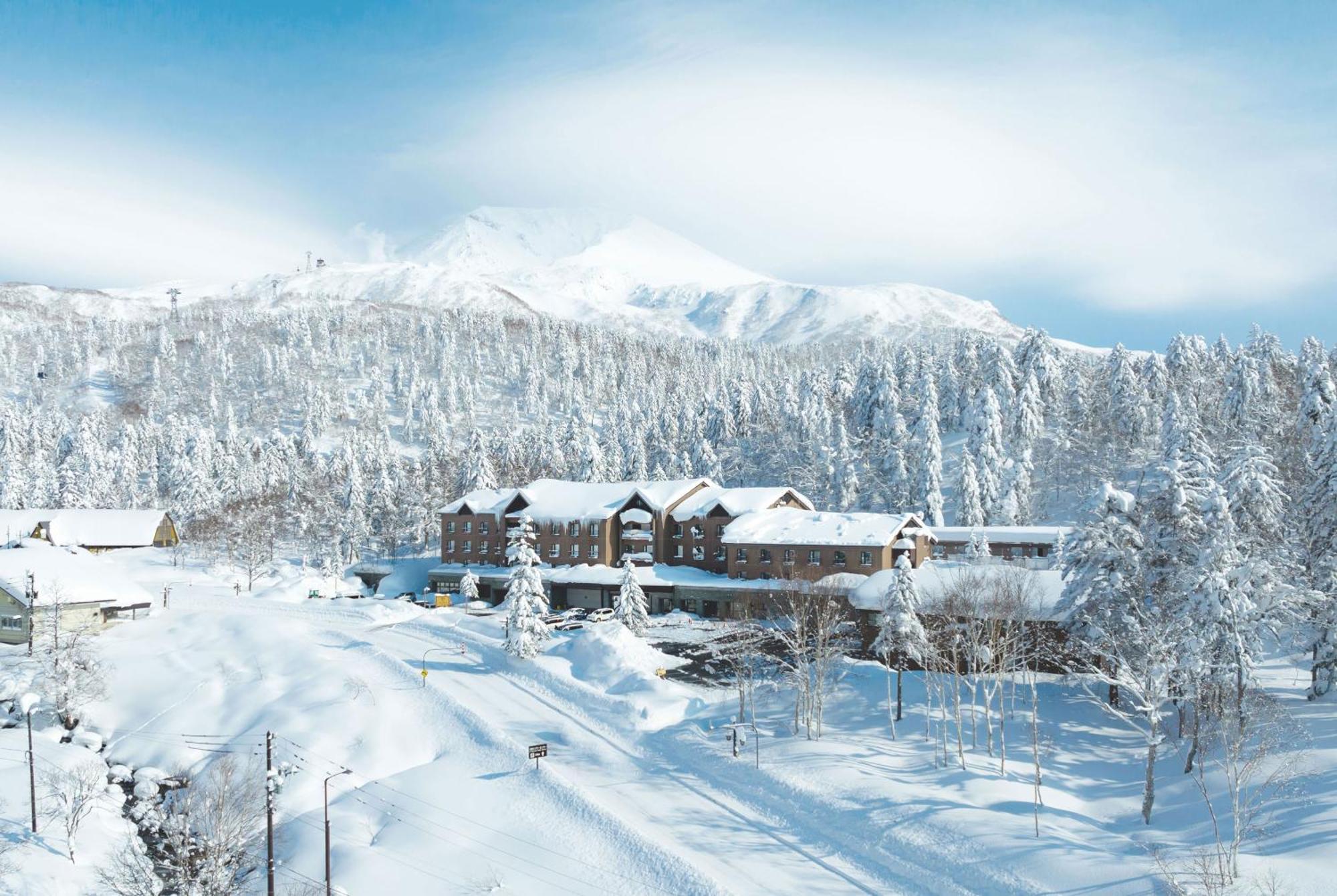 Higashikawa Asahidake Onsen Hotel Bear Monte Esterno foto