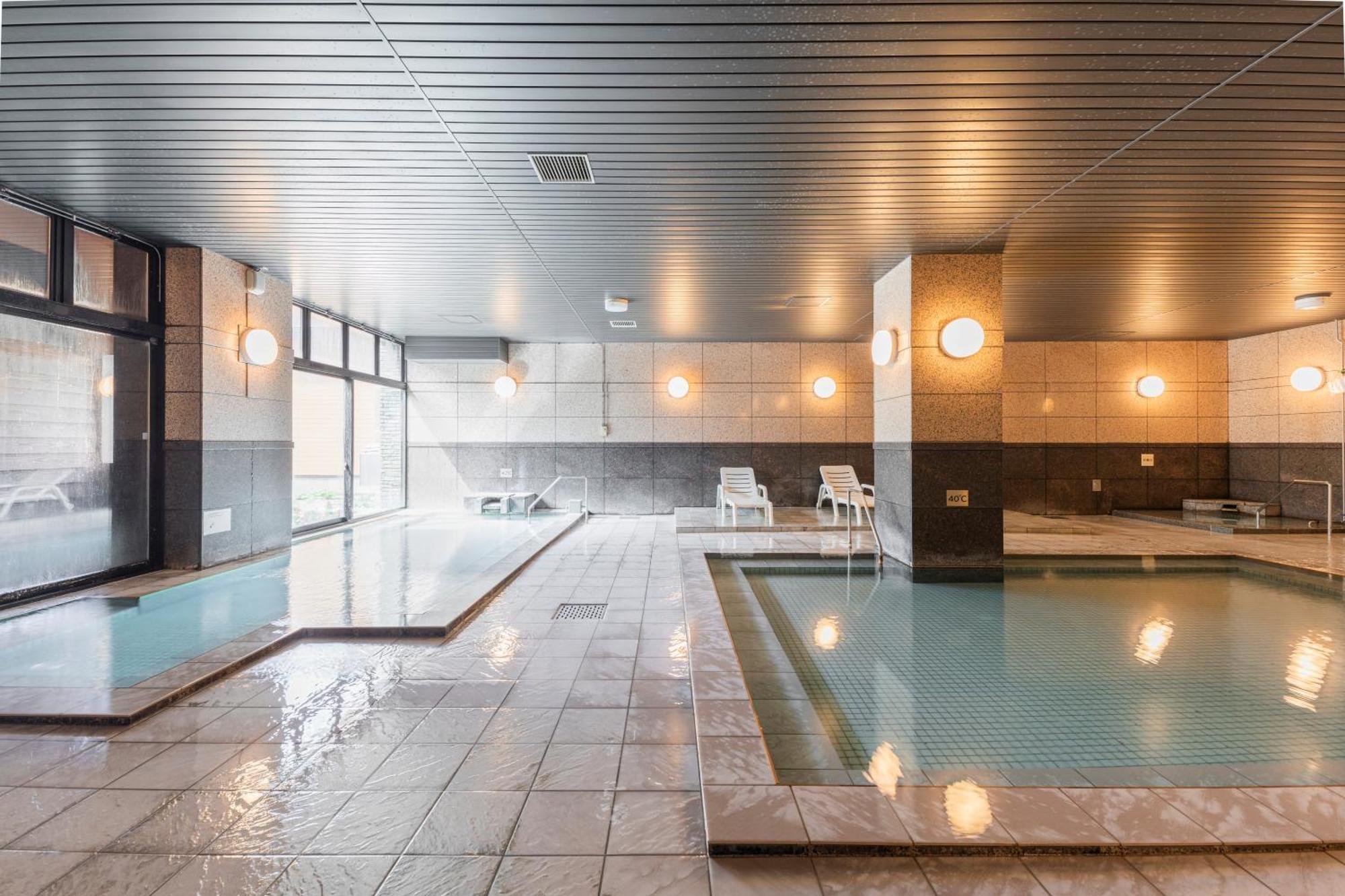 Higashikawa Asahidake Onsen Hotel Bear Monte Esterno foto