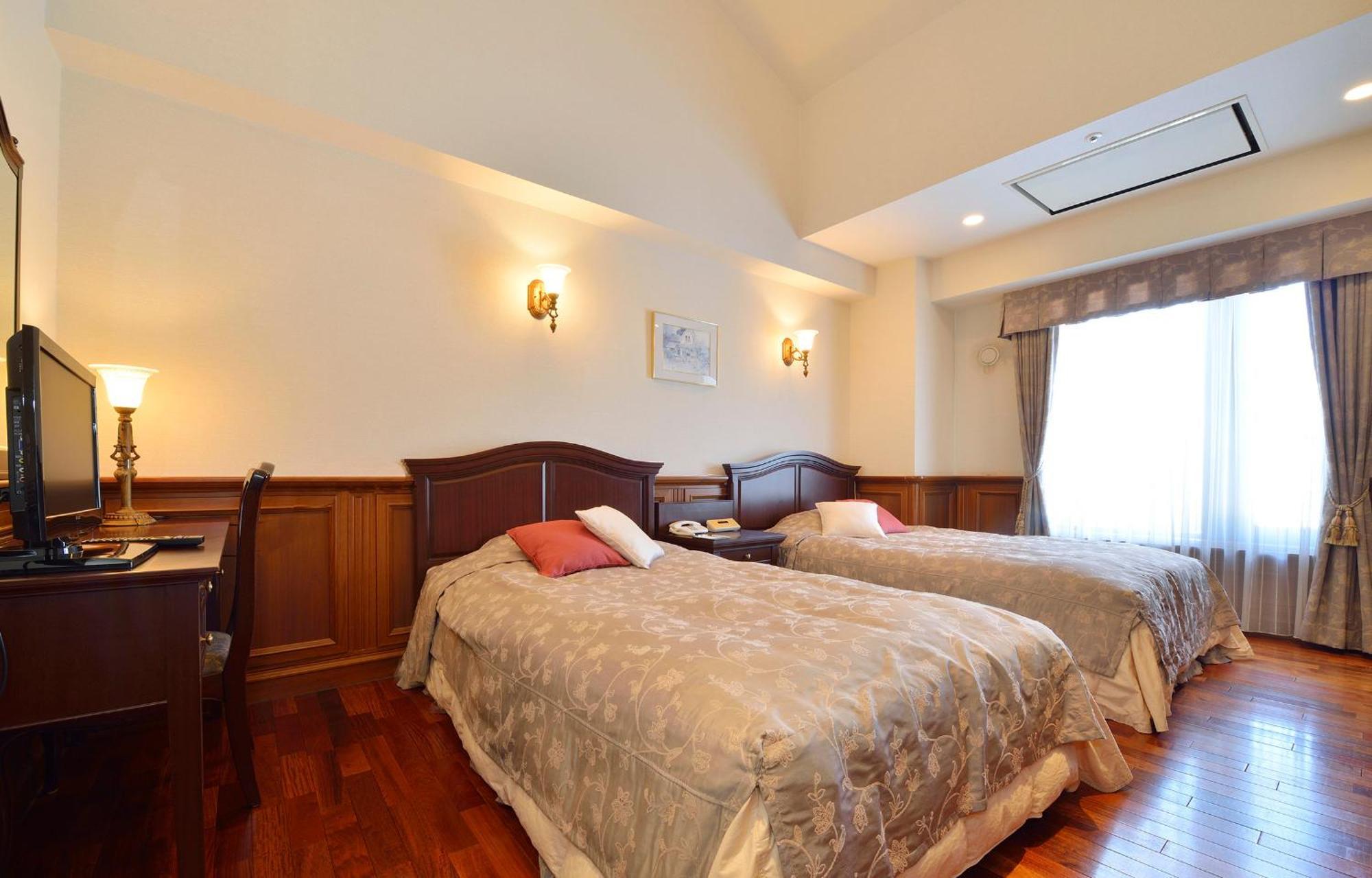 Higashikawa Asahidake Onsen Hotel Bear Monte Esterno foto